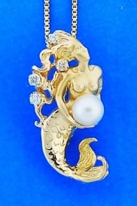 14k steven douglas mermaid holding a pearl