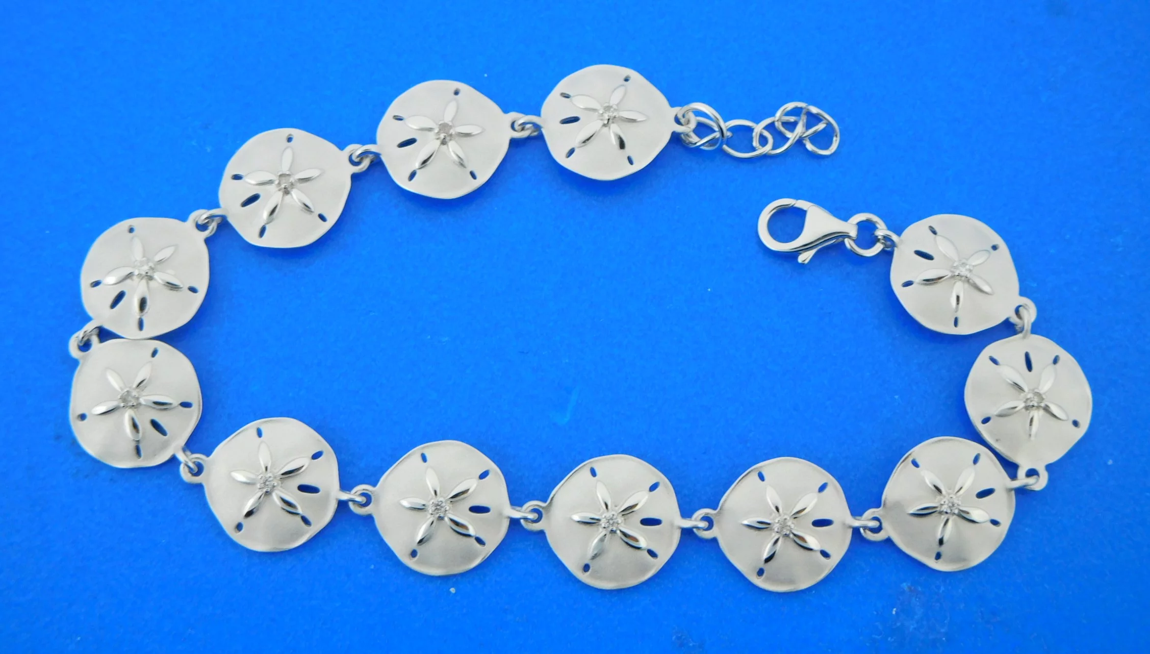 sterling silver sand dollar bracelet