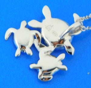 sterling silver family of sea turtles pendant