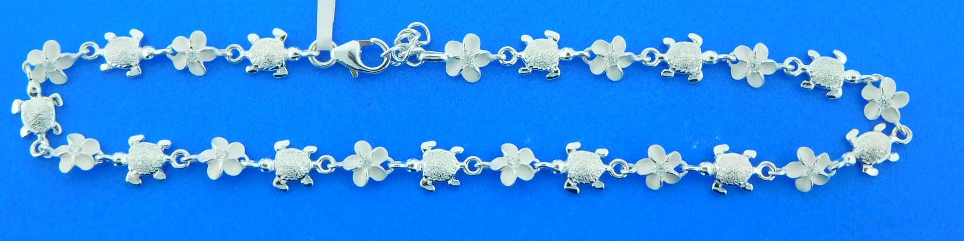 sterling silver plumeria and sea turtle anklet