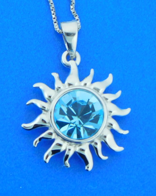 Sun pendant with dangling crystals
